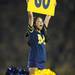 A Michigan cheerleader holds a sign and yells "go" during the first quarter Saturday against Notre Dame.
Melanie Maxwell | AnnArbor.com